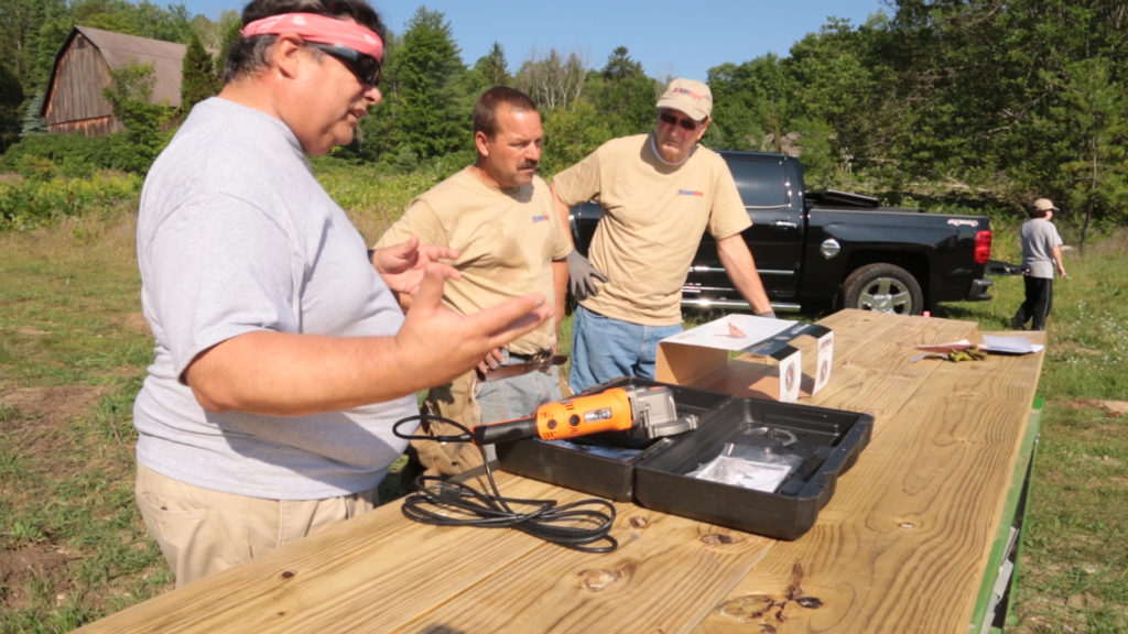 Team members meet before starting the day