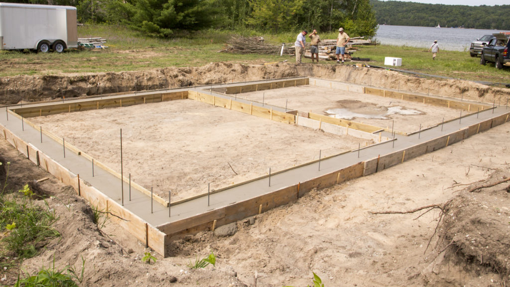 Vertical rebar extending from footings