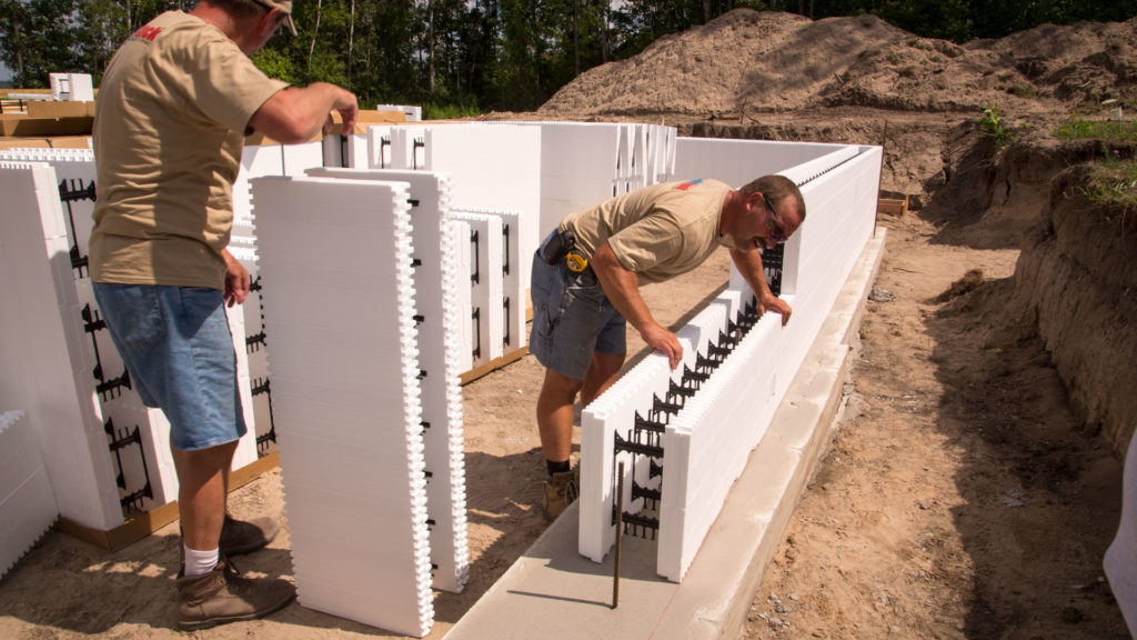 ICF basement walls being stacked on to a footing