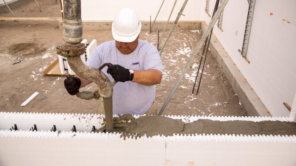Pouring concrete into an ICF wall