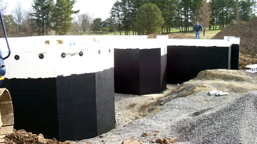 ICF wall with spray on waterproof membrane