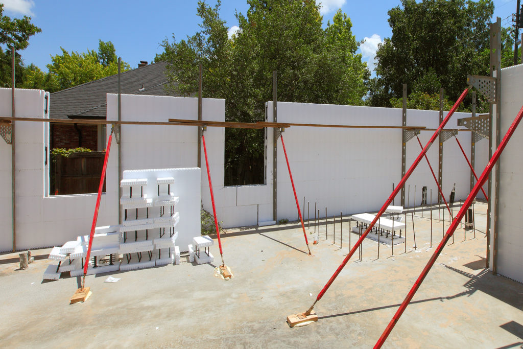 ICF walls stacked and braced with window openings cut