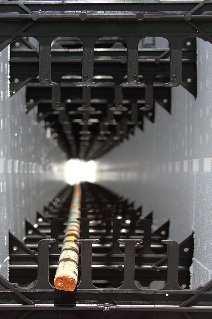 Blocks are stacked so that webs align vertically